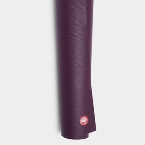 EUC Manduka Yoga Mat with commuter carrier pockets and strap